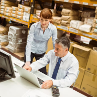 Professionals working in warehouse Professionals working in warehouse