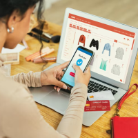Woman shopping online with phone Woman shopping online with phone